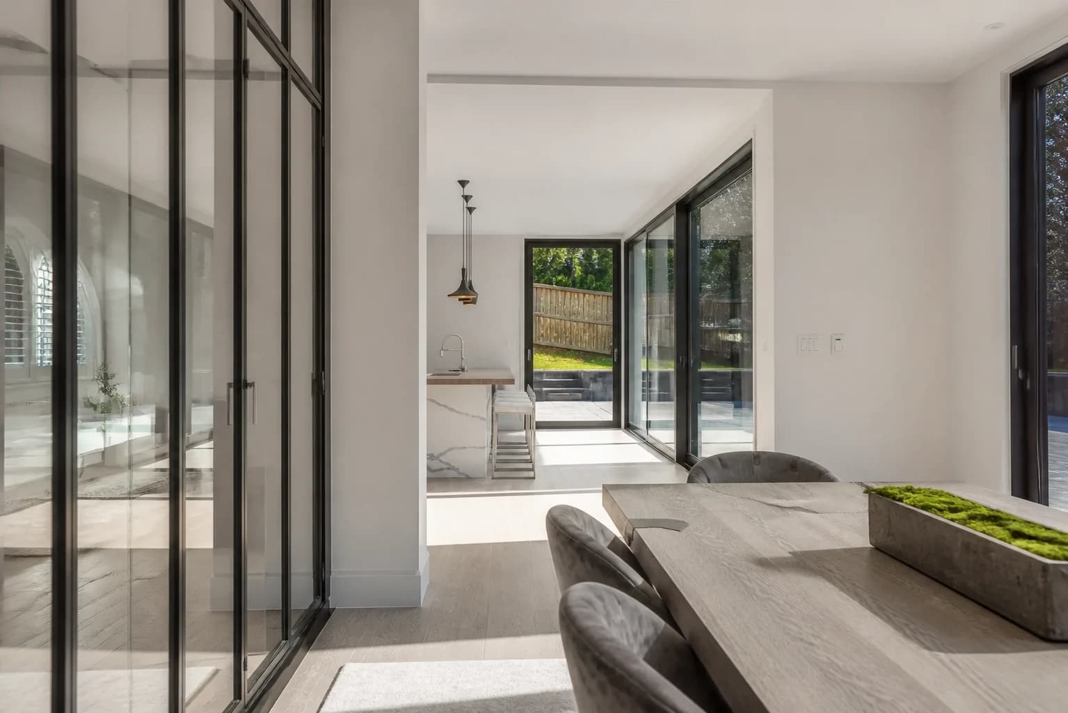 Editorial visualization across a glazed dining threshold